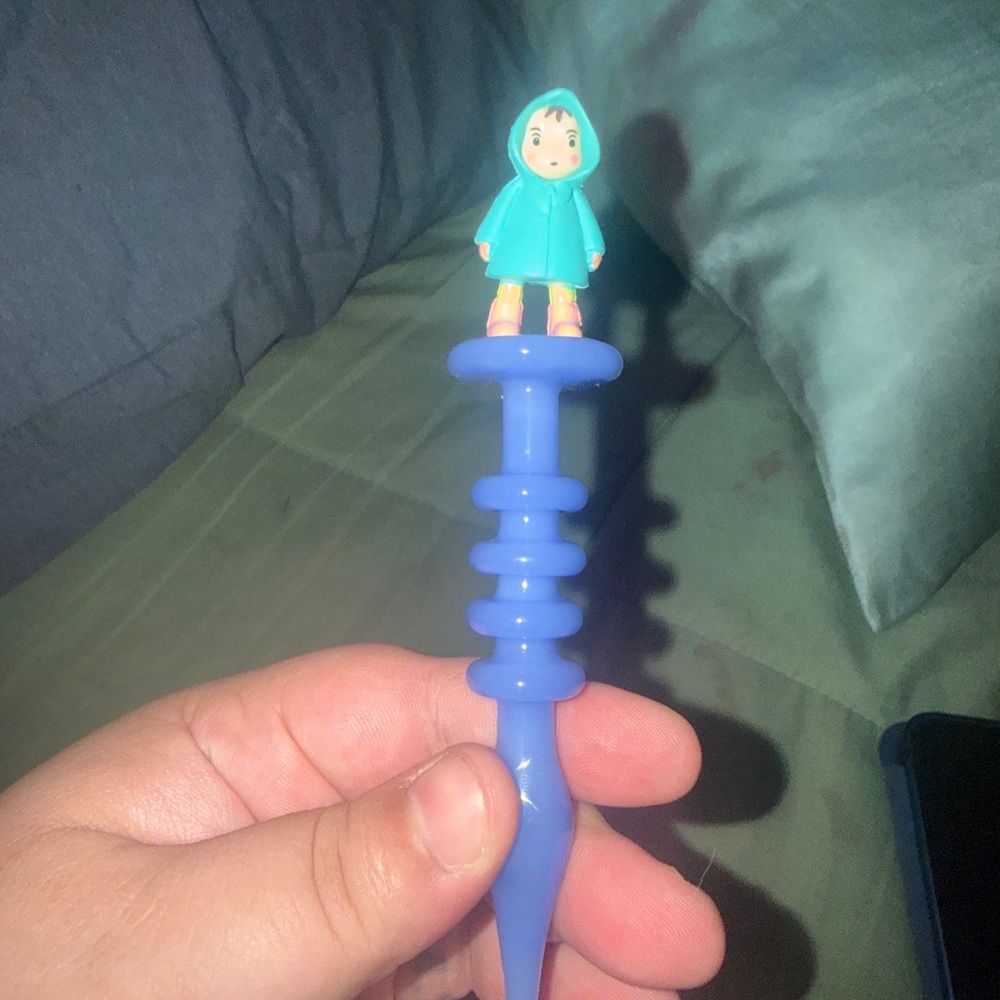 Blue and Green Kids Toy Figure